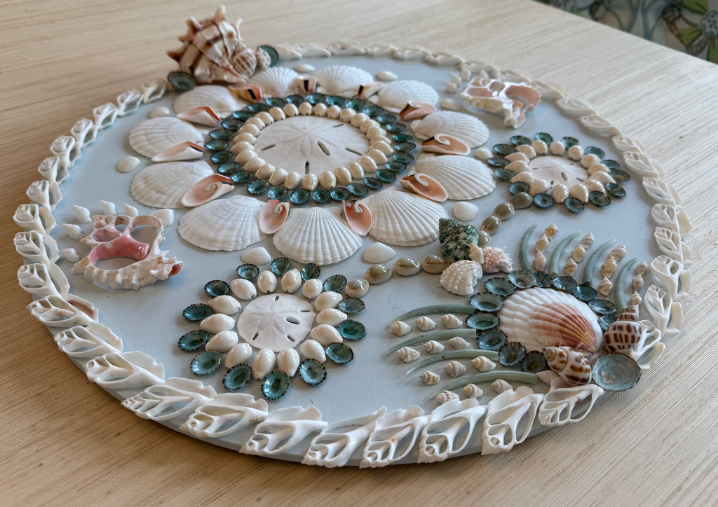 Serenely circular shell panel with seafoam and aqua seashells in concentric ring pattern, 18 inch diameter coastal wall art